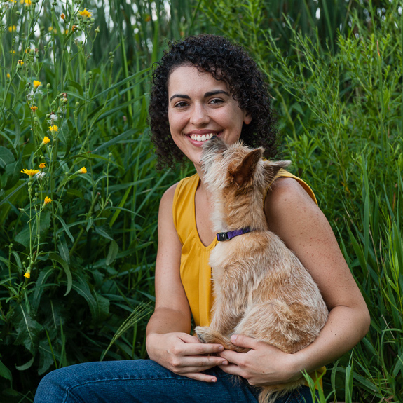 Photo of Julia and canine companion Brandy